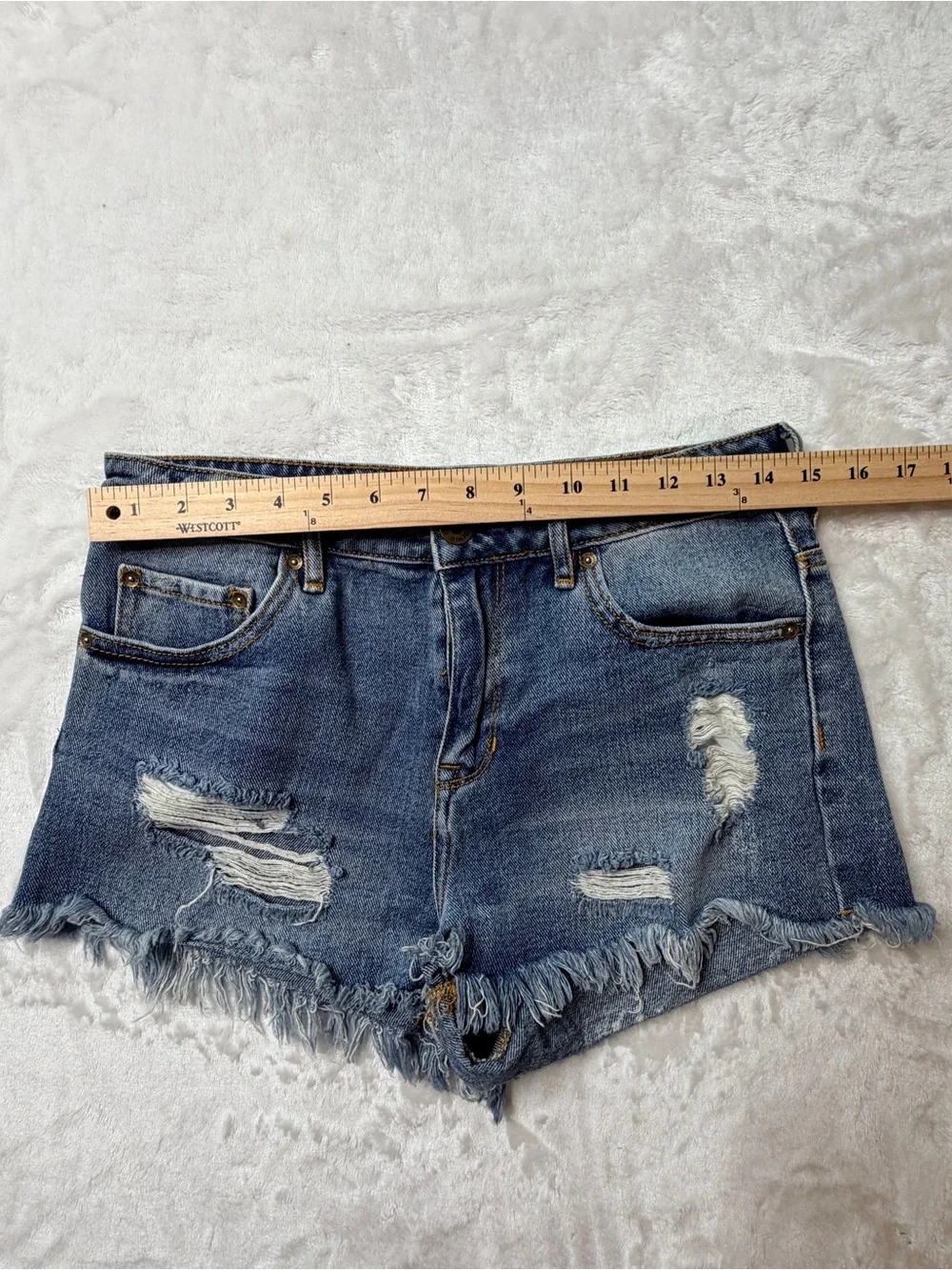 BullHead denim Co. Women's Distressed Blue Denim cutoff  mid/high rise Shorts.